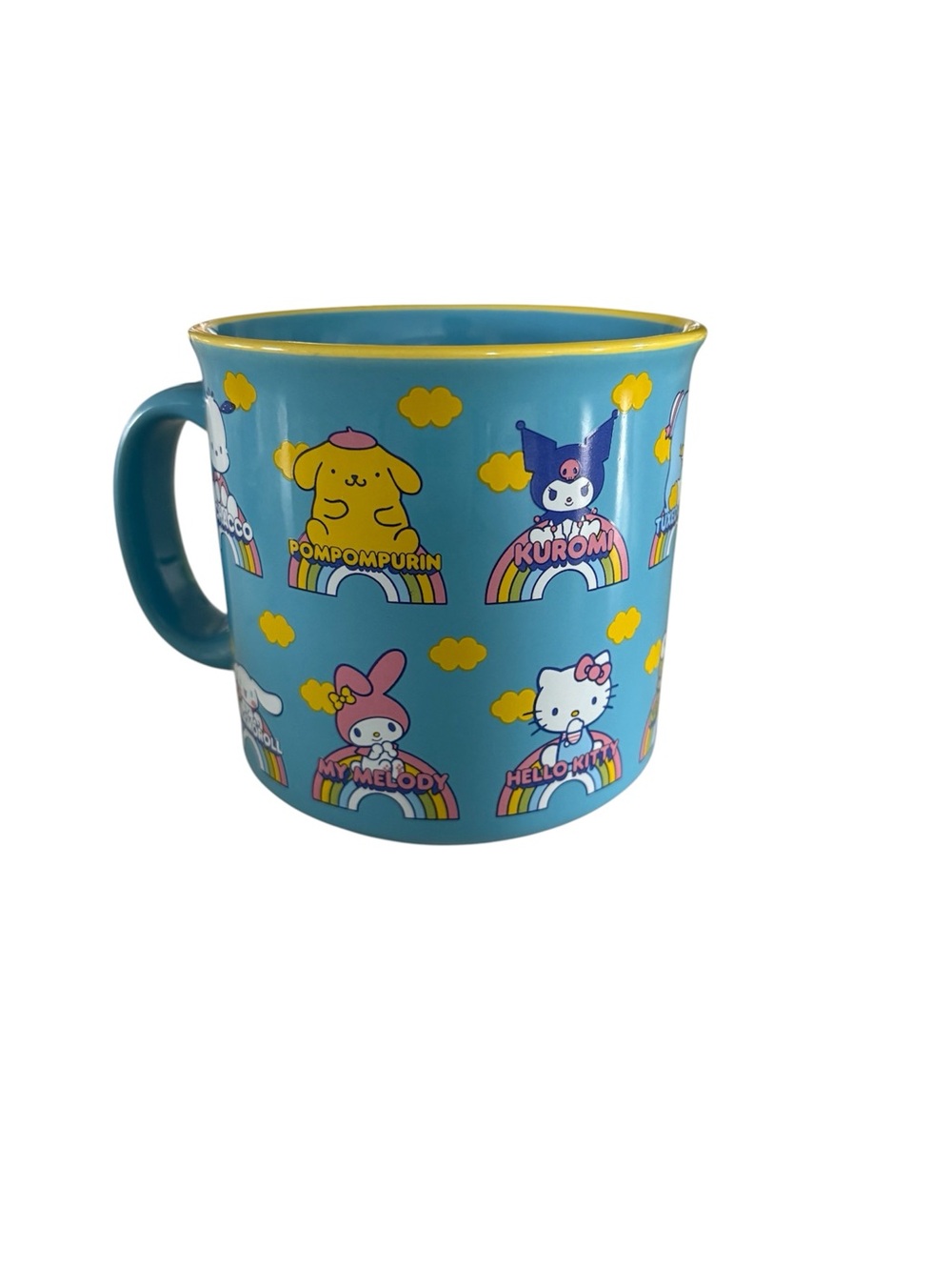 Sanrio Blue Ceramic Mug with Yellow Accent and Rainbow Characters